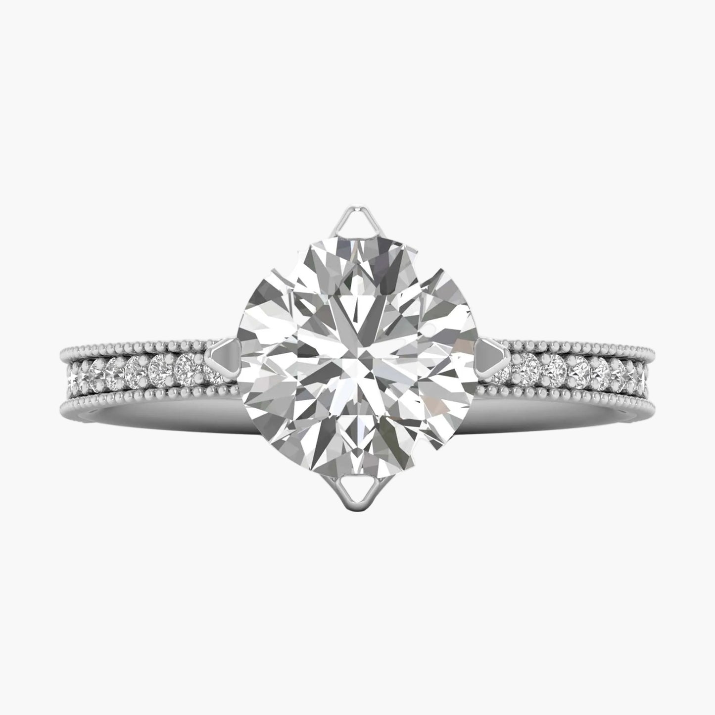 Diamond ring with a large central gemstone and smaller stones on a white background