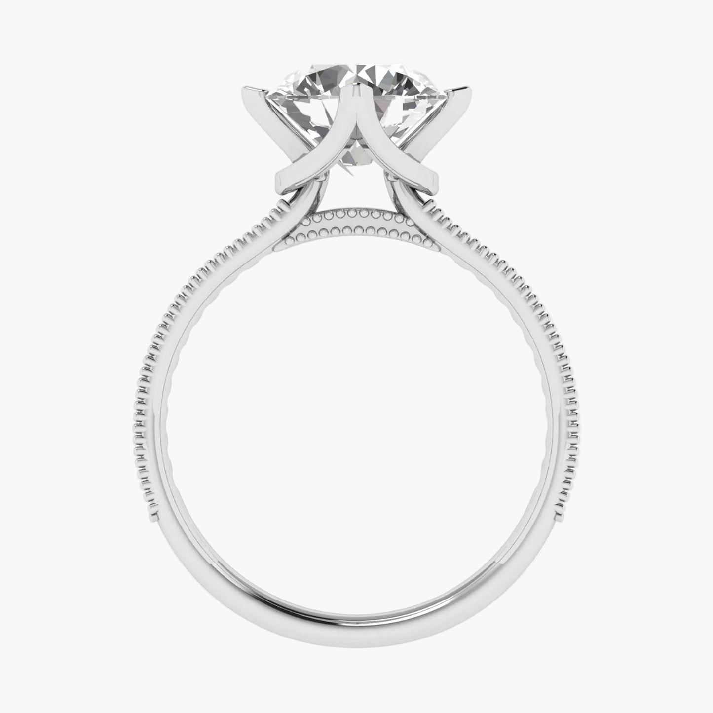 Diamond ring with a bow-shaped setting on a white background