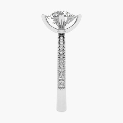 Silver earring with a clear gemstone on a white background