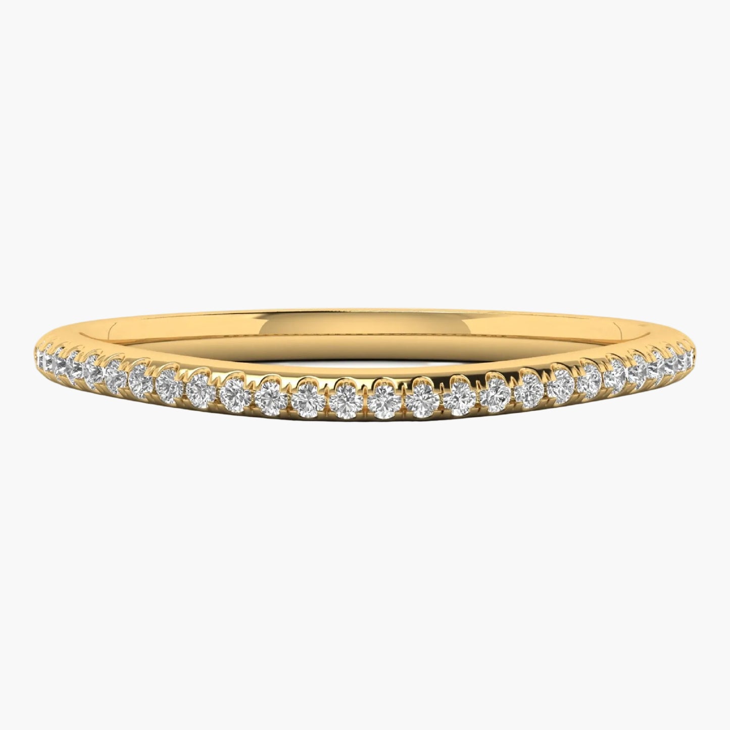Gold ring with small diamonds on a white background