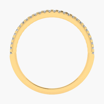 Gold ring with small diamonds on a white background