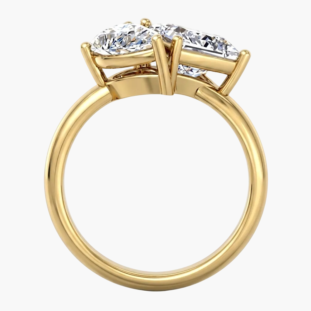 Gold ring with three diamonds on a white background