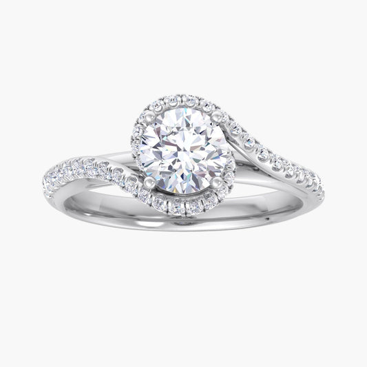 Silver ring with a large central diamond and smaller diamonds on the band against a white background