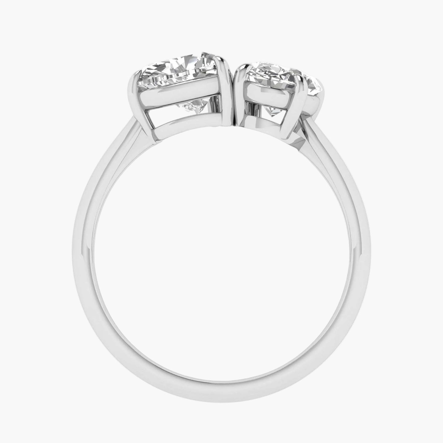 Silver ring with two diamond stones on a white background