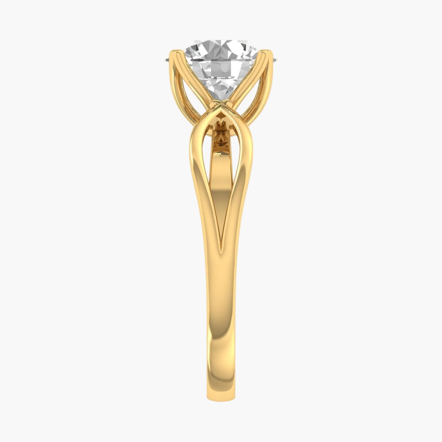 Gold ring with a clear gemstone on a white background