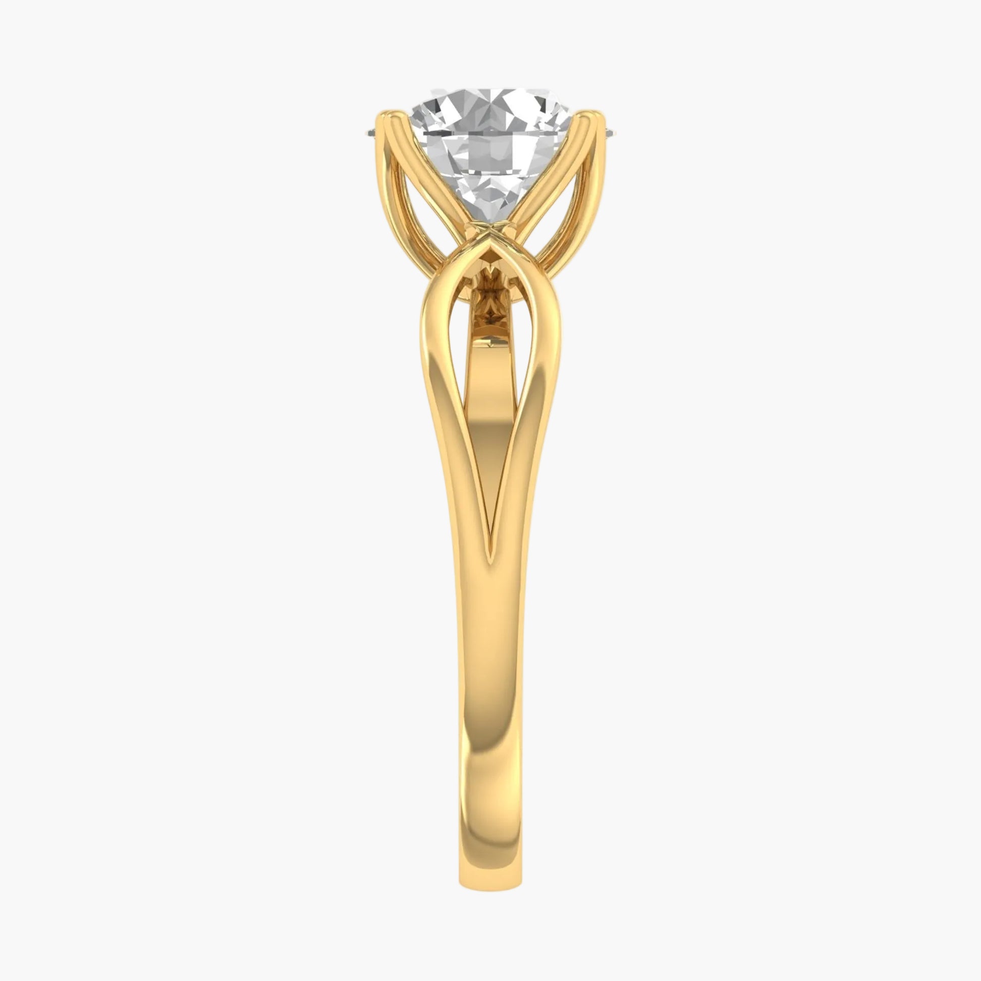Gold ring with a clear gemstone on a white background