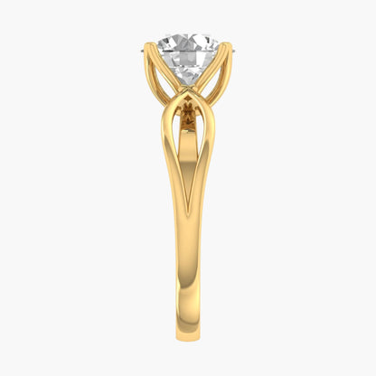 Gold ring with a clear gemstone on a white background