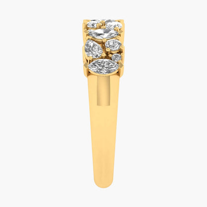 Gold ring with diamond stones on a white background