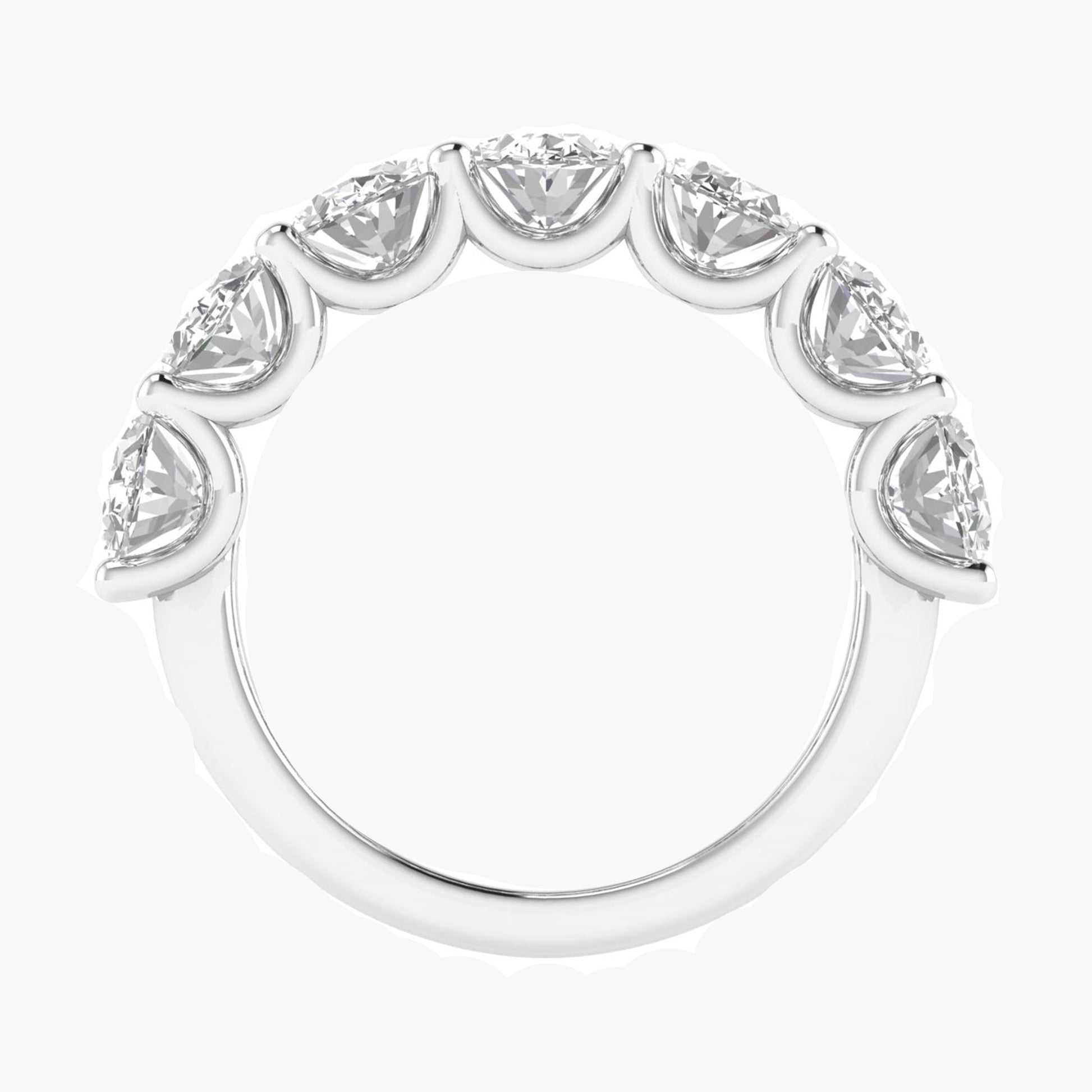 Silver ring with pear-shaped diamonds on a white background