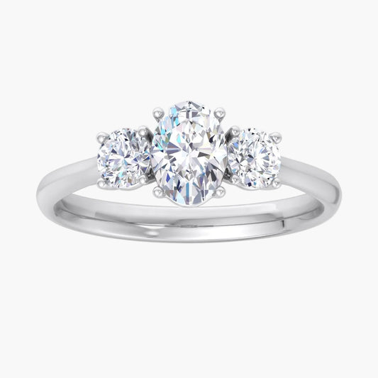 Silver ring with three diamonds on a white background