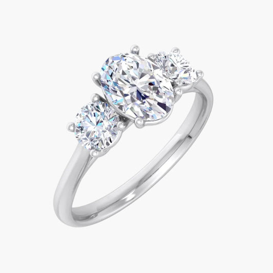 Diamond ring with three stones on a white background