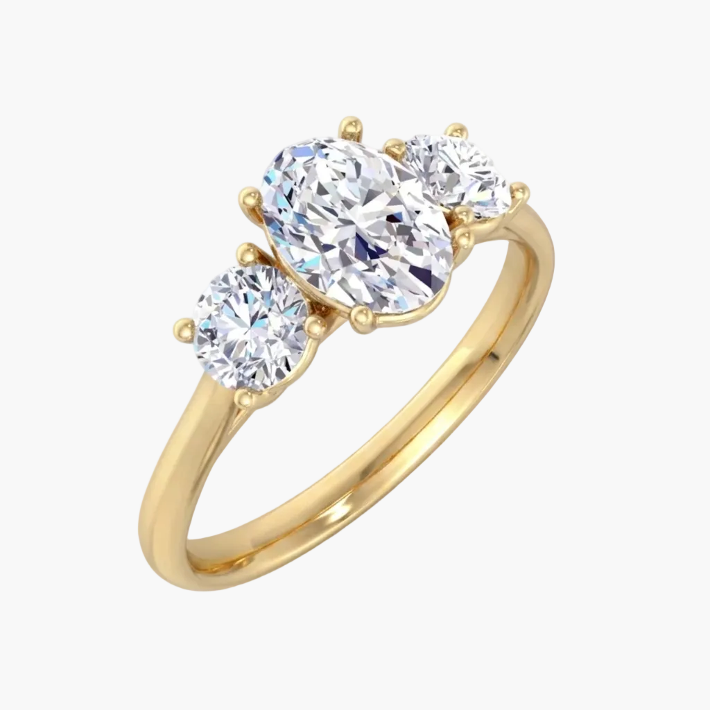 Gold ring with three diamonds on a white background
