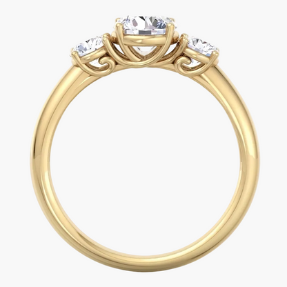 Gold ring with three diamonds on a white background