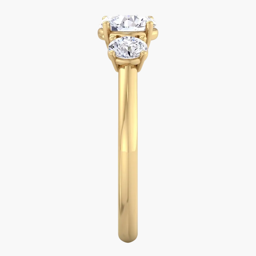 Gold ring with two diamonds on a white background