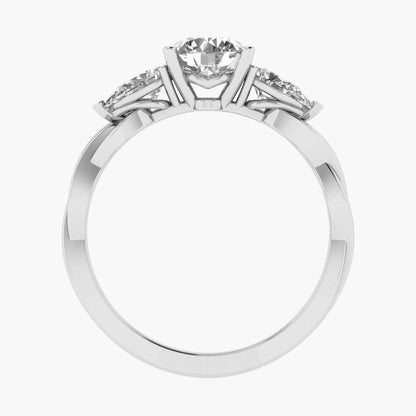 Diamond ring with a central gemstone and two smaller stones on a white background