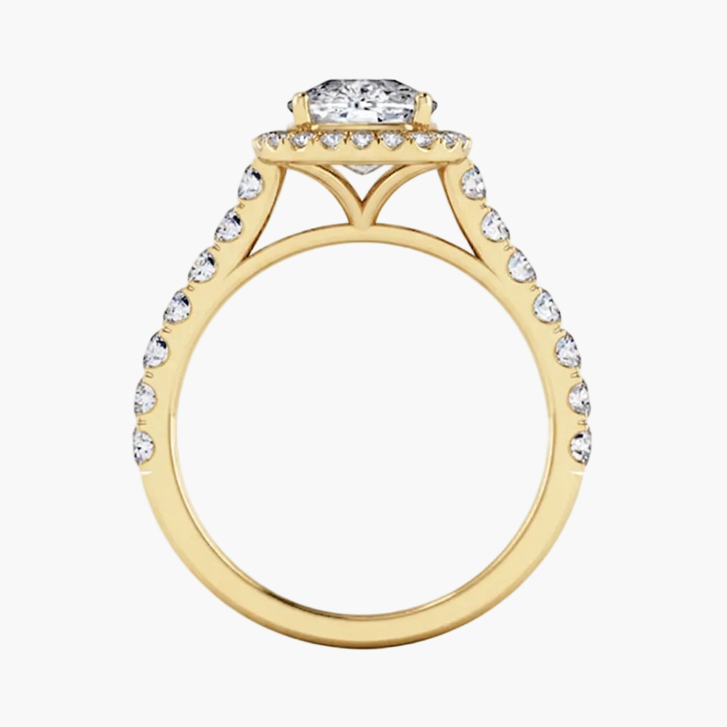 Gold ring with diamond accents on a white background