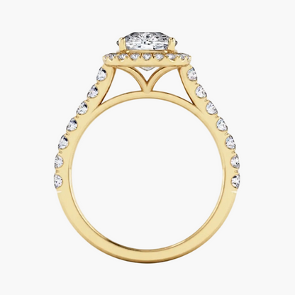 Gold ring with diamond accents on a white background