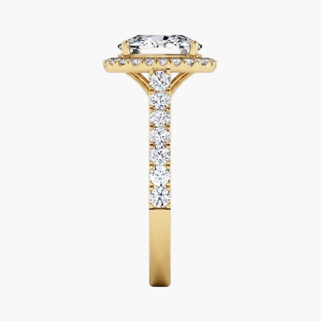Gold ring with a diamond on a white background