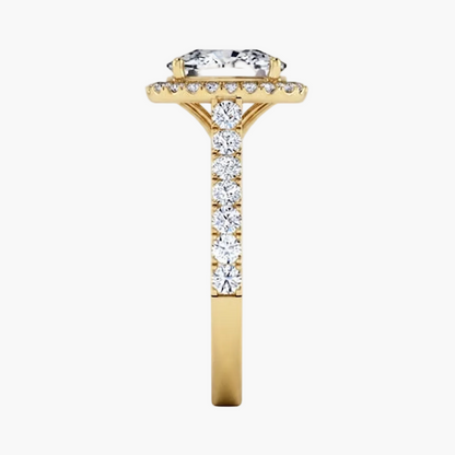 Gold ring with a diamond on a white background