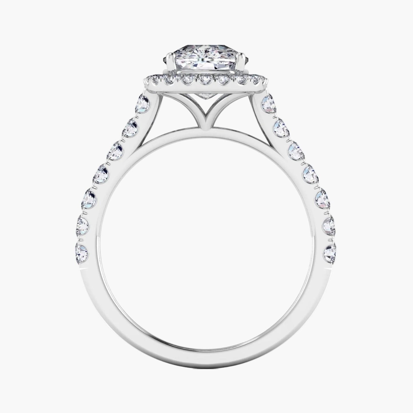 Diamond ring with a halo and smaller diamonds on a white background