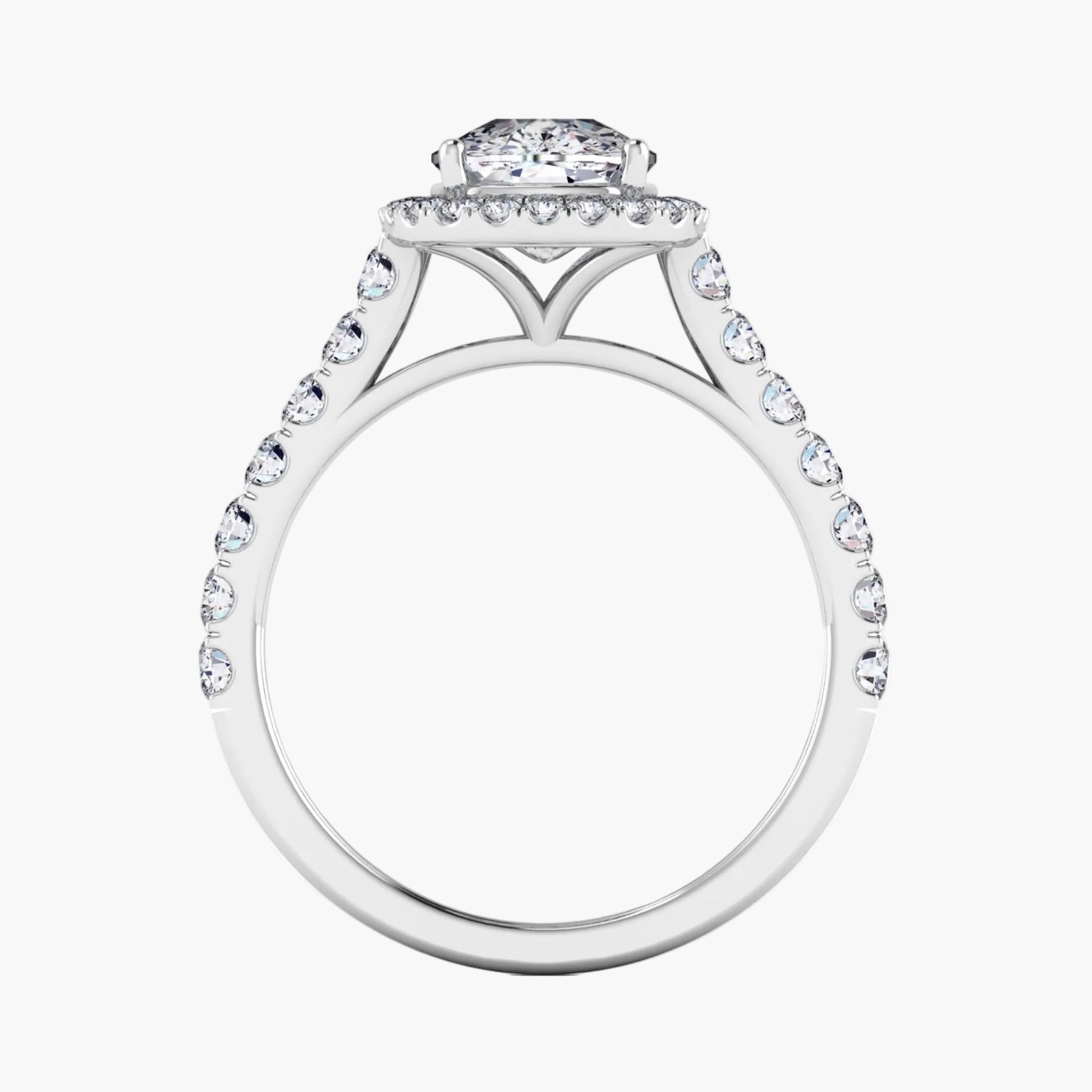 Diamond ring with a halo and smaller diamonds on a white background