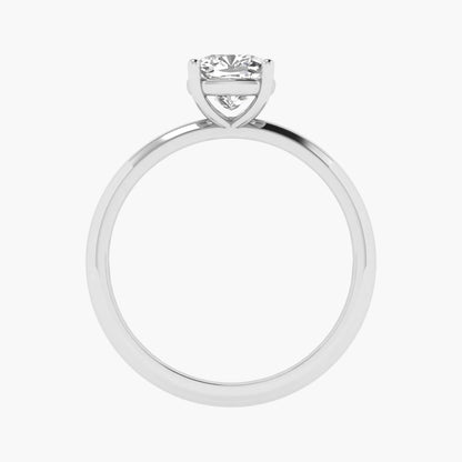 Silver ring with a heart-shaped diamond on a white background