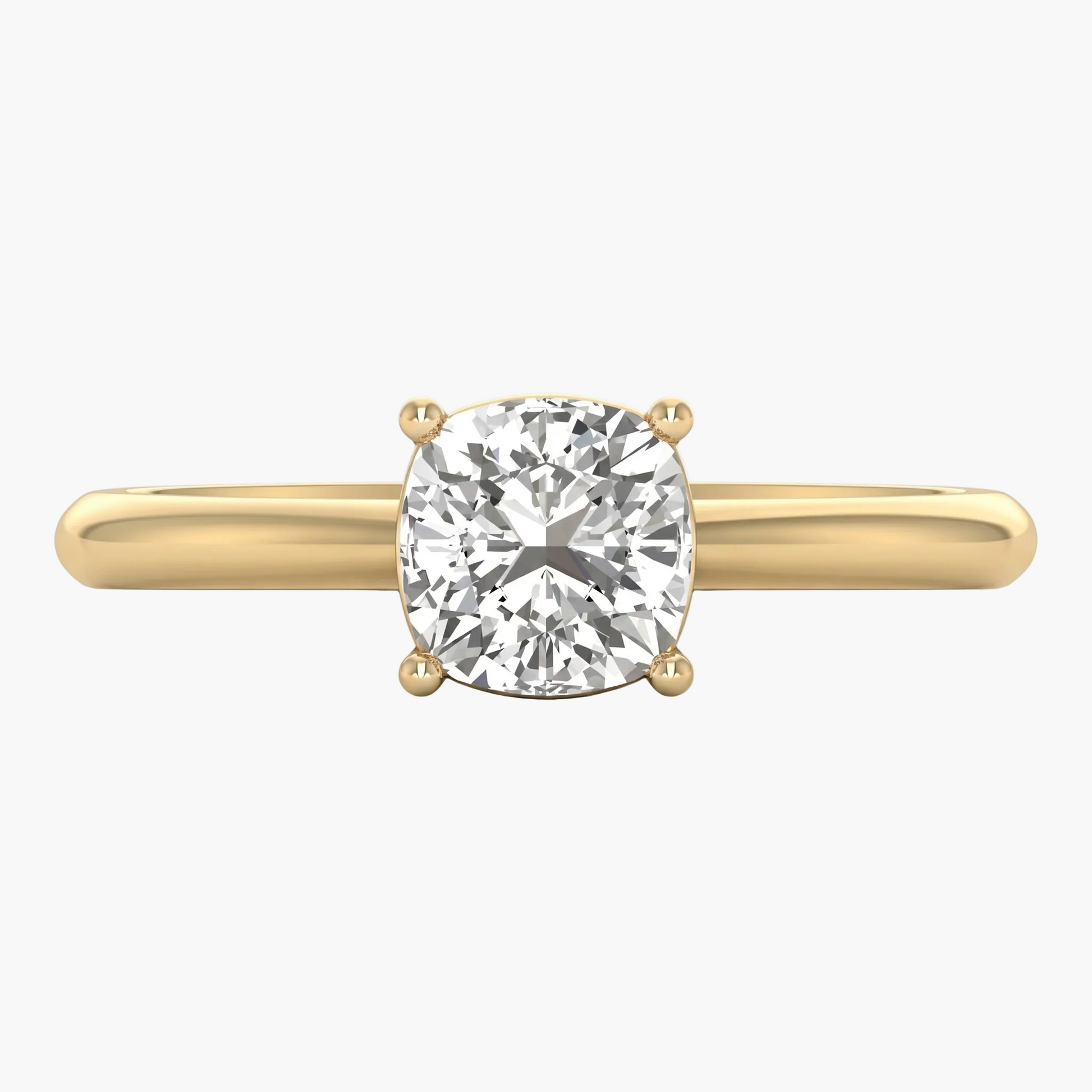 Gold ring with a large diamond on a white background