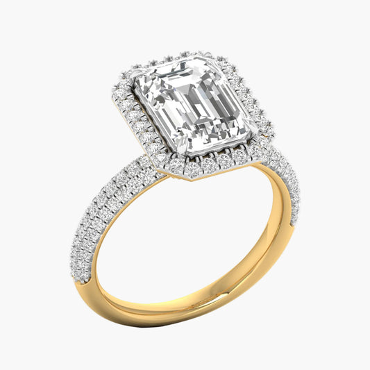 Diamond ring with a yellow gold band on a white background