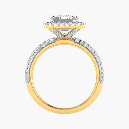 Two-tone gold ring with diamond accents on a white background