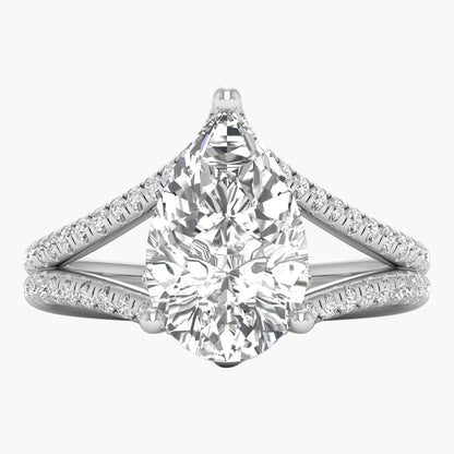 Diamond ring with a pear-shaped center stone on a white background