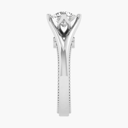 Silver ring with a diamond on a white background