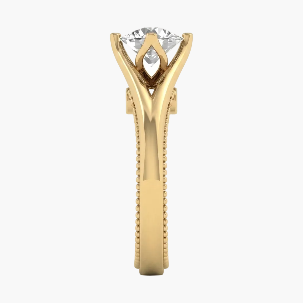 Gold ring with a diamond on a white background