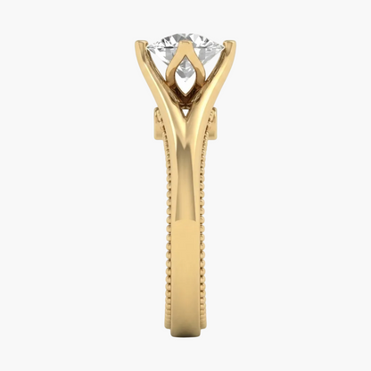 Gold ring with a diamond on a white background