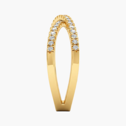 Gold ring with diamonds on a white background