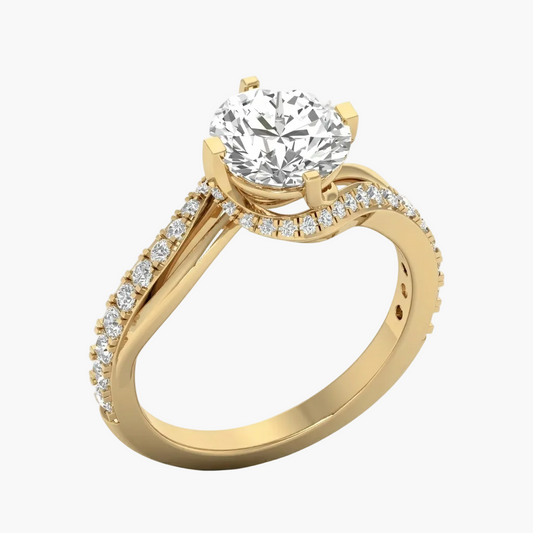 Gold ring with a large diamond and smaller diamonds on the band against a white background