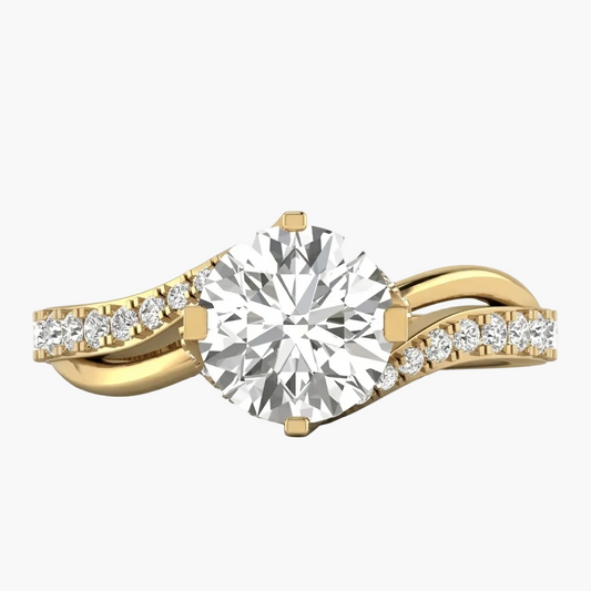 Gold and diamond ring on a white background