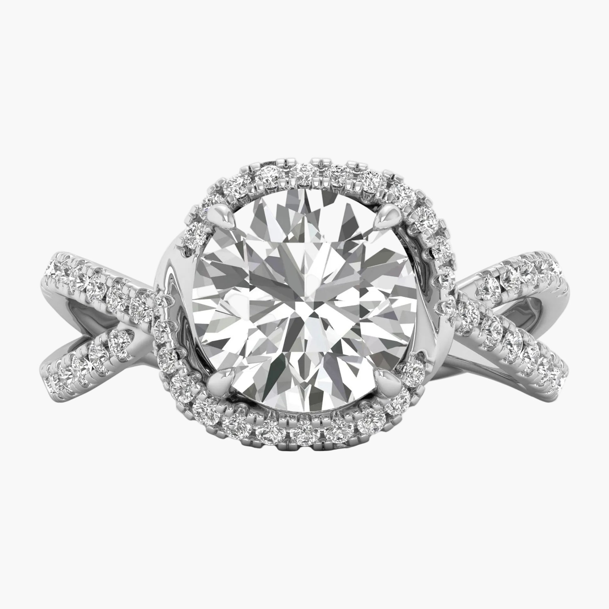 Diamond ring with a large central gemstone and smaller stones on a white background