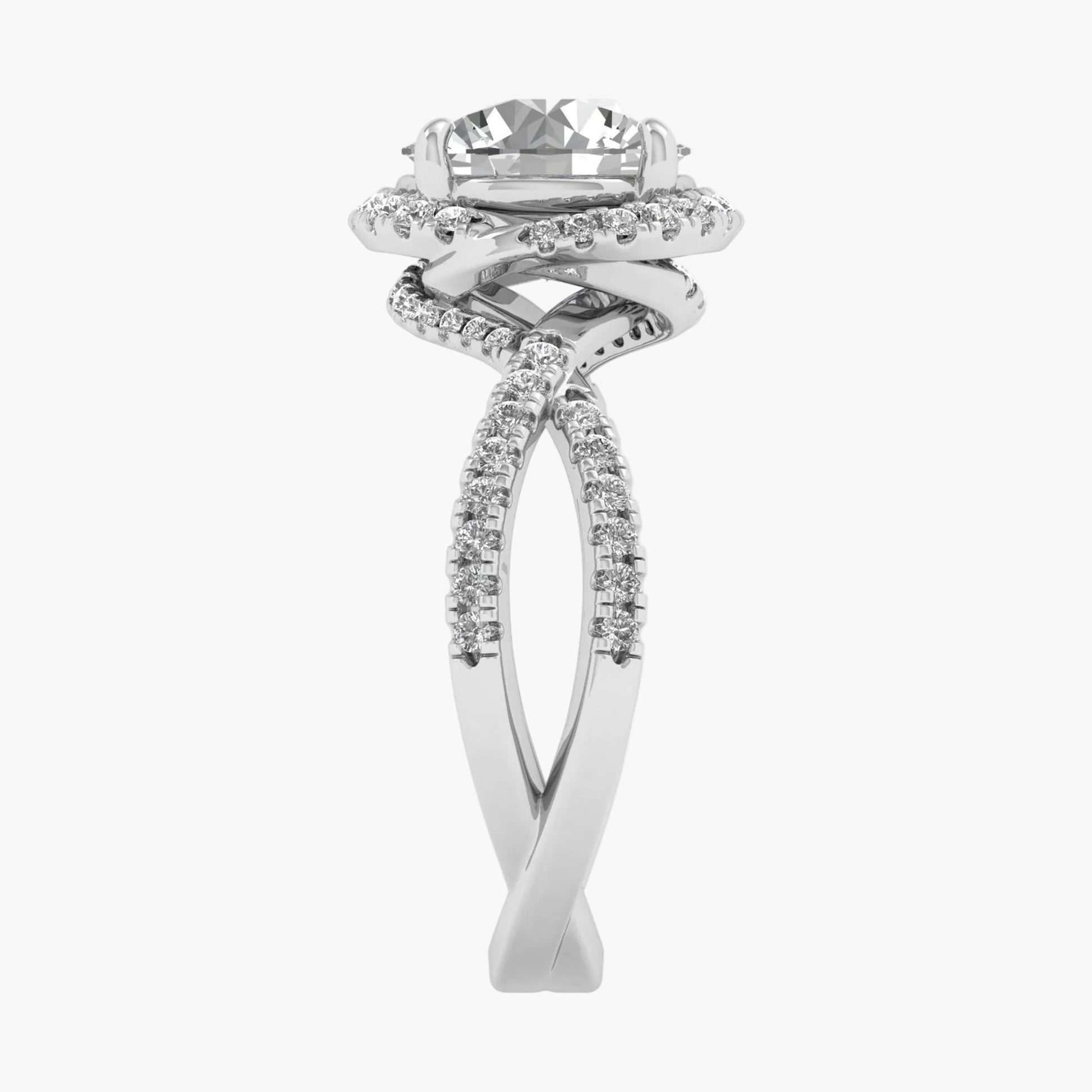 Silver ring with a large central gemstone and smaller stones on a white background