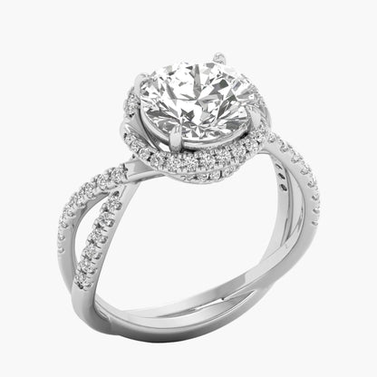 Silver ring with a large diamond and smaller diamonds on the band against a white background