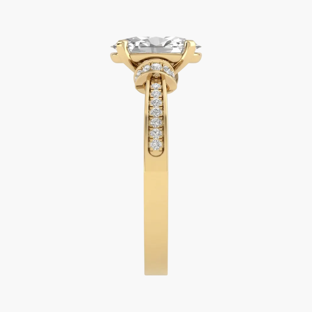 Rose gold ring with a heart-shaped gemstone on a white background