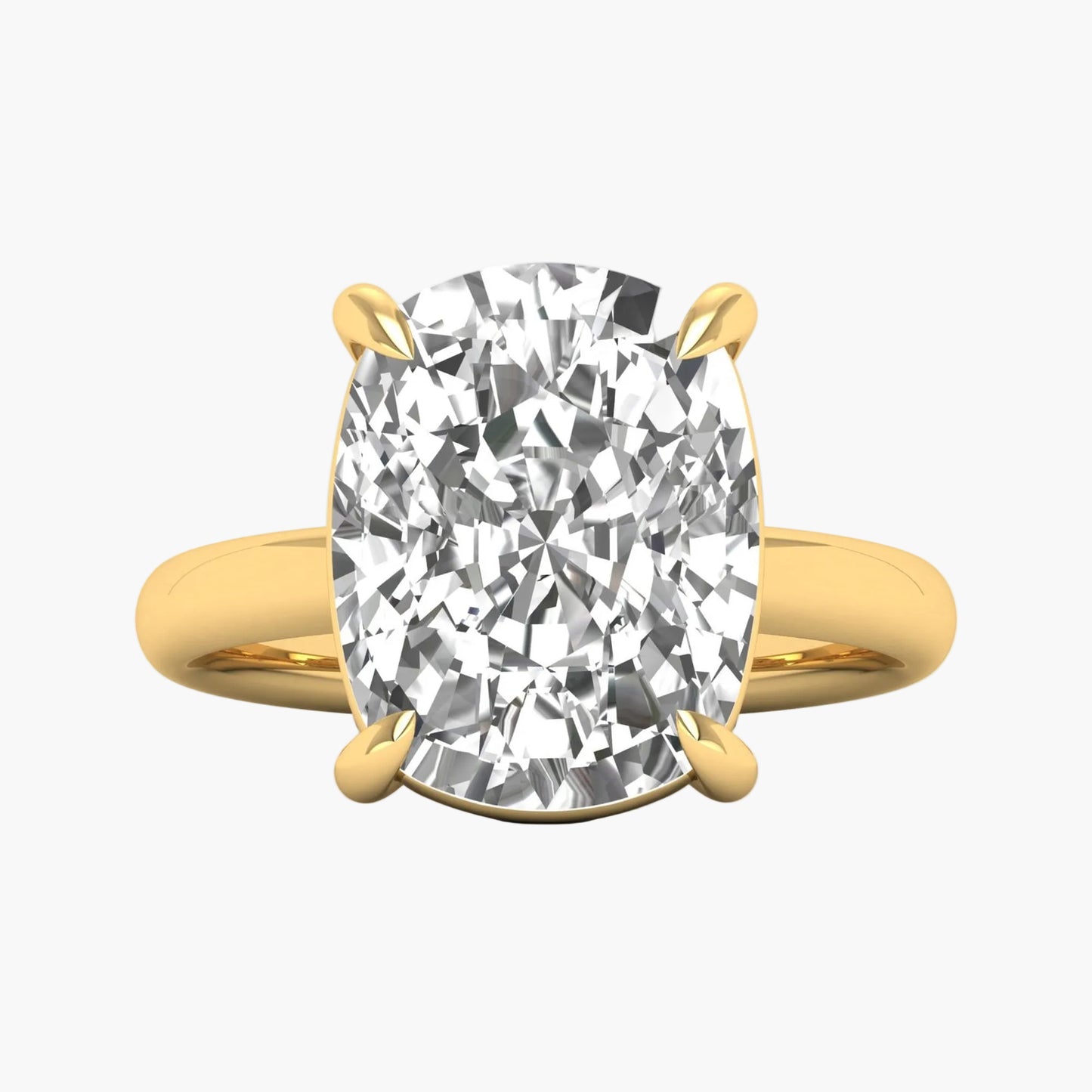 Gold ring with a large diamond on a white background