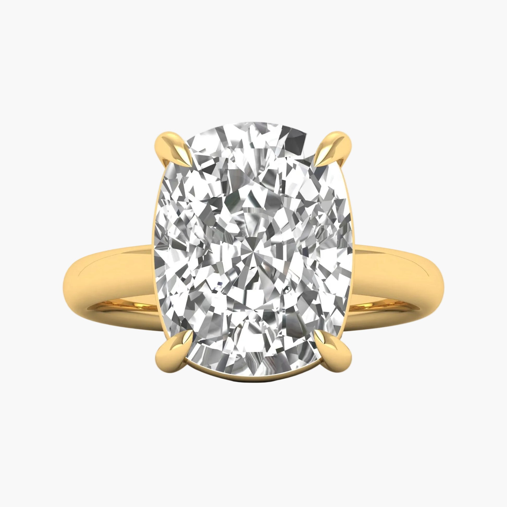 Gold ring with a large diamond on a white background