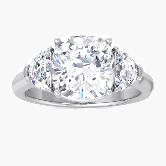 Silver ring with two large clear gemstones on a white background