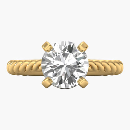 Gold ring with a large diamond on a white background