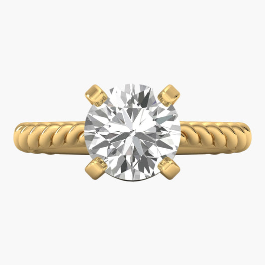 Gold ring with a large diamond on a white background