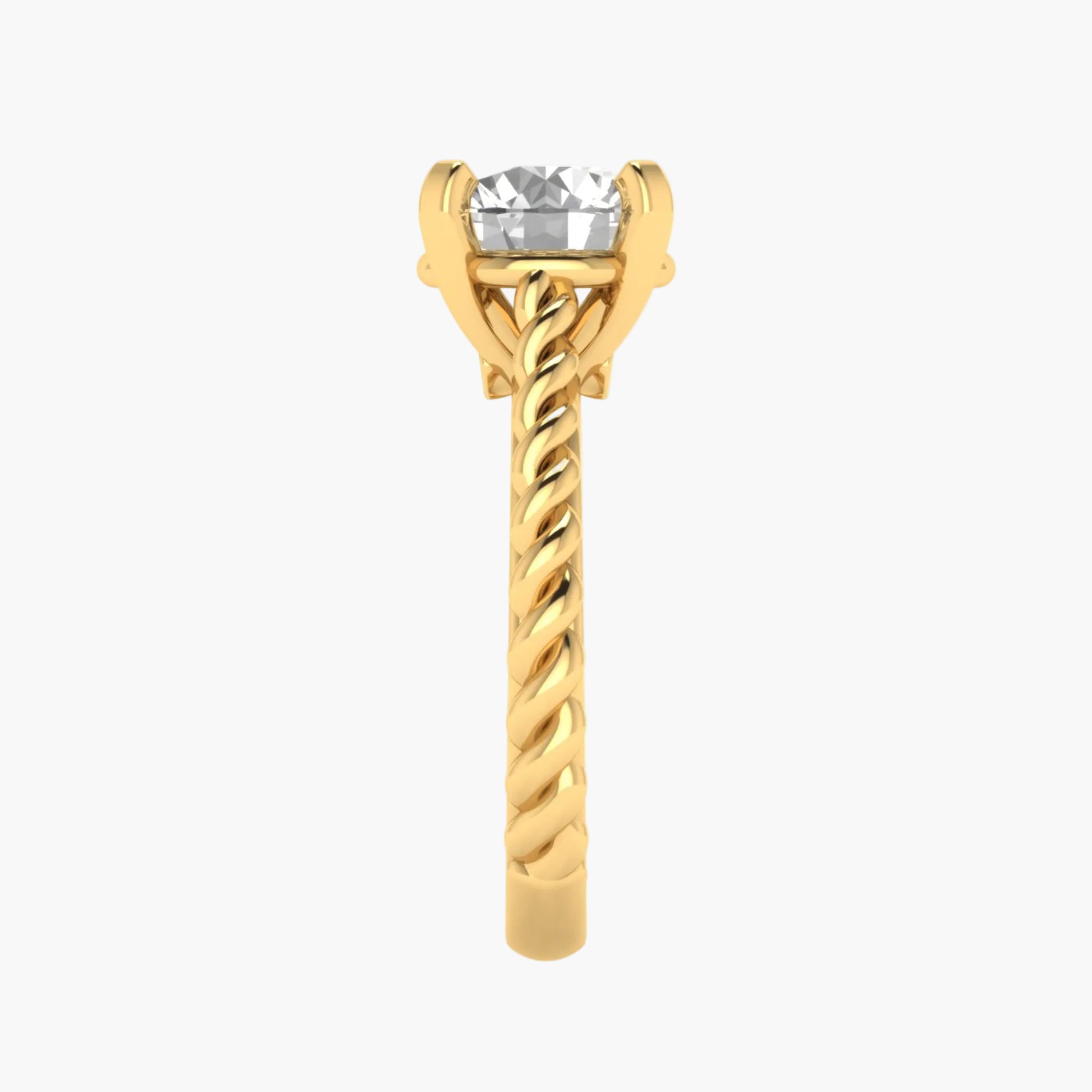 Gold ring with a clear gemstone on a white background