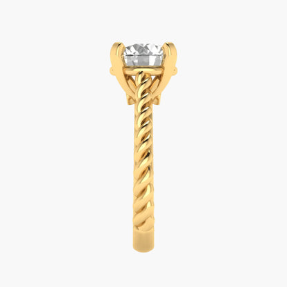 Gold ring with a clear gemstone on a white background