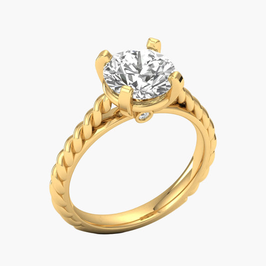 Gold ring with a diamond on a white background
