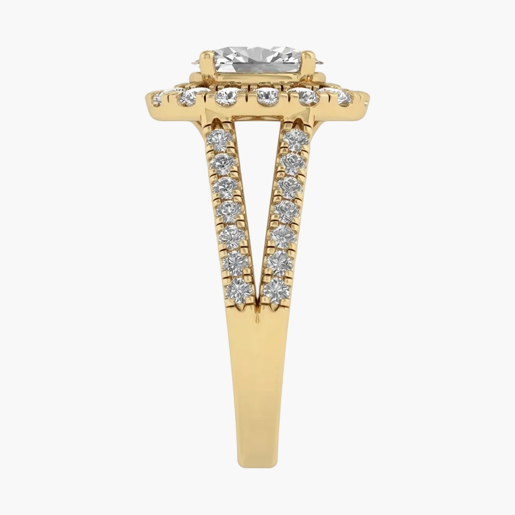 Gold ring with a central diamond and smaller diamonds on the band against a white background