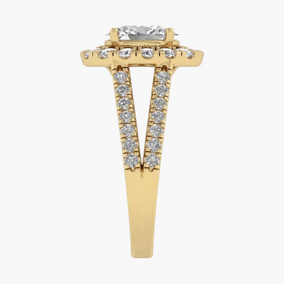 Gold ring with a central diamond and smaller diamonds on the band against a white background